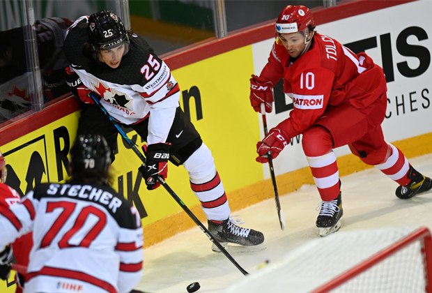 Canadian player Owen Power and player of the Russian national team Sergey Tolchinsky (right)